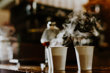 Disposable coffee cup on table