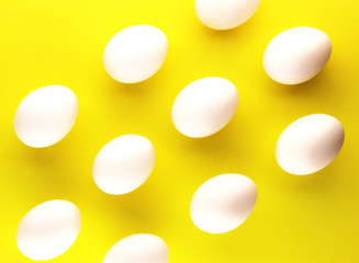 white eggs on a yellow background. Easter egg for the holiday