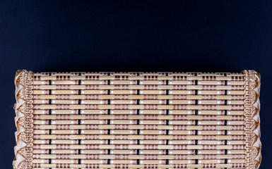 Element of a straw cloth made in an artistic style, antique.