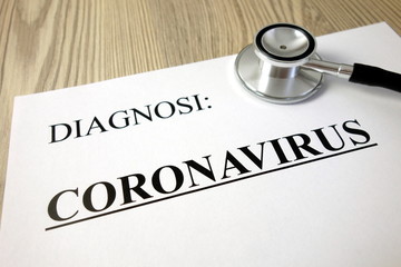 Fototapeta premium Text diagnosi (Italian: diagnosis) coronavirus on medical document with stethoscope