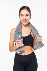 Fitness sporty muscular woman drinking water, isolated against white background