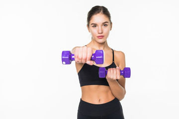 Young fitness woman working out with dumbbell isolated white background