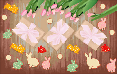 Easter banner with gift box, pink tulips, bunny cookies on a wooden table, spring