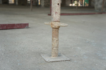 Jack base in construction site. Scaffolding screw base.