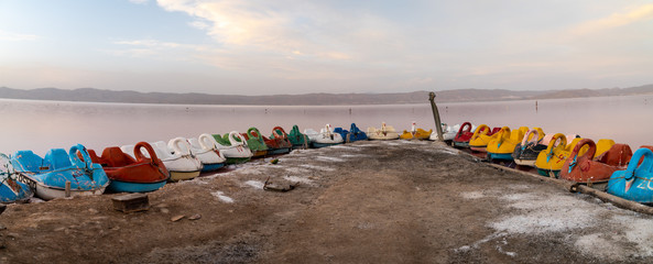 Abandoned pedal boats by Maharloo pink lake, Shiraz, Iran