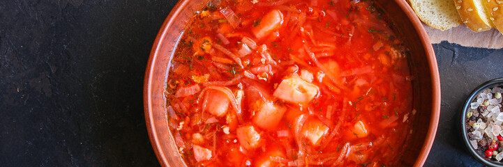 red tomato soup and vegetables and meat, borsch (Russian or Ukrainian cuisine) menu concept background. top view. copy space for text