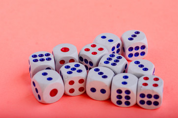 Dice over pink background