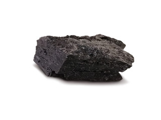 Lignite coal on white background. Lignite is a soft, brown, combustible, sedimentary rock formed from naturally compressed peat. There is noise and grain caused by the texture of the coal.