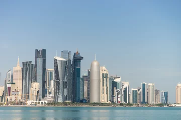 Foto op Plexiglas View of city center with skyscrapers from the other side of sea in Doha, Qatar  © Hladchenko Viktor