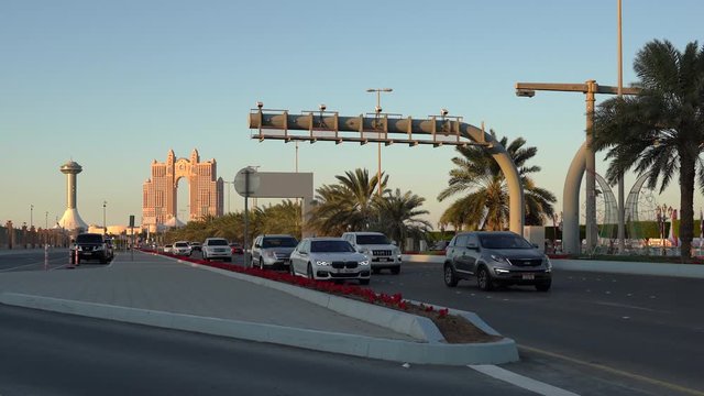 Abu Dhabi city corniche road at sunset | View of the Marina Mall and Fairmont Marina Abu Dhabi | Time-lapse