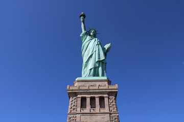 Fototapeta na wymiar Statue of Liberty from liberty Island Clear Sky