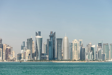 Fototapeta na wymiar View of city center with skyscrapers from the other side of sea in Doha, Qatar 