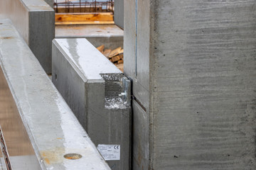 concrete cross beams are connected to concrete columns for a factory building