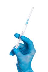 Close up of female doctor's hand in blue sterilized surgical glove with plastic medical syringe white background