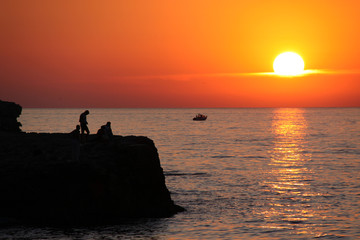 Amazing beautiful sunset on the sea coast
