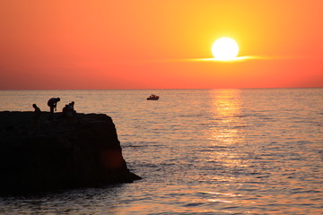 Amazing beautiful sunset on the sea coast