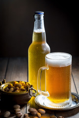 Light beer in a glass on the table