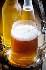 Light beer in a glass on the table