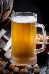 Light beer in a glass on the table