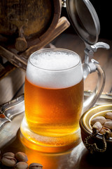 Light beer in a glass on the table