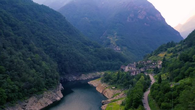 Flying towards the village of Vogorno in the Verzasca valley in the Swiss alps