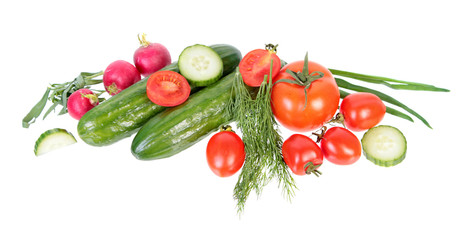 Fresh green cucumbers, different red tomatoes and bundle of green dill leaves isolated on white background. Ingredients for vegetable salad