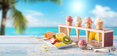 fruit ice cream varieties and fruits on the table, by the ocean