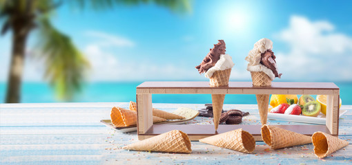 ice cream and empty cones at the seaside on the blue table