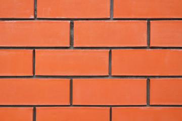 Red brick wall. Close-up. Horizontal view. Background. Texture.