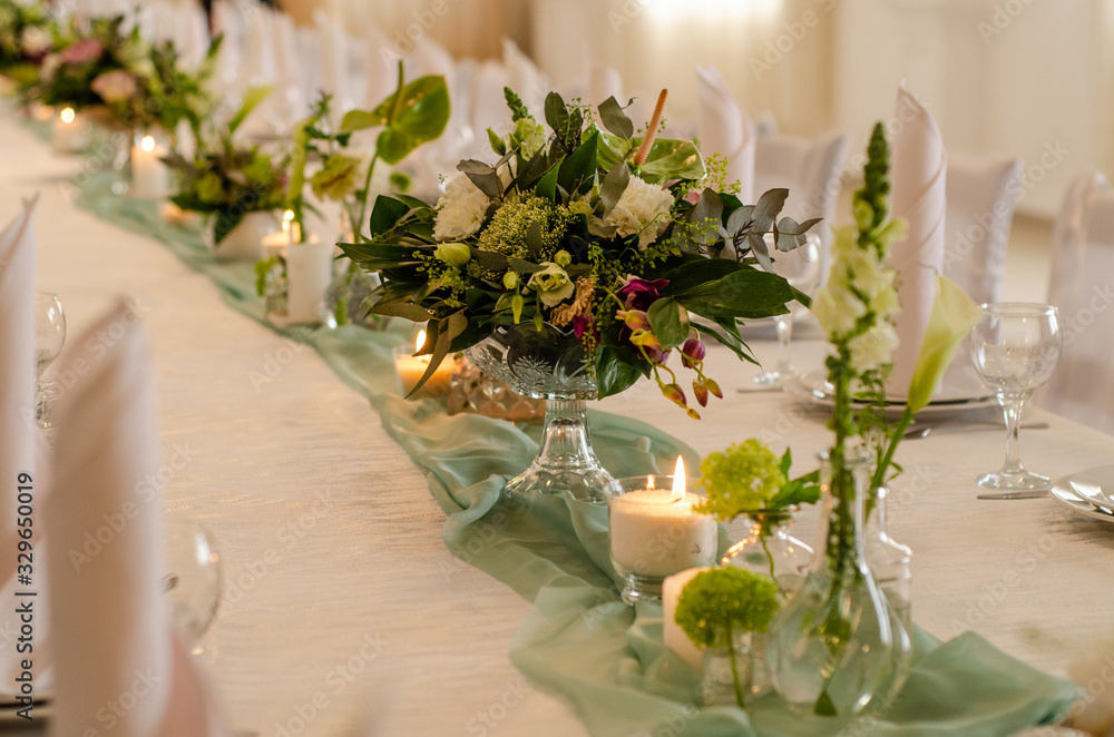 Wall mural beautiful flowers on table in wedding day