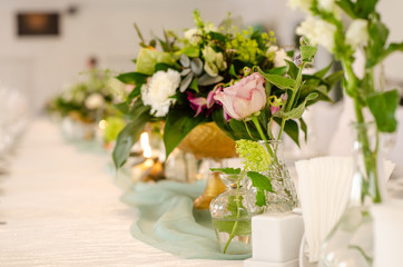 Obraz na płótnie Canvas Beautiful flowers on table in wedding day