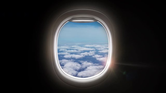 Black background with copy space with look of window seat frame of airplane flight see view of clouds, wing travel during coronavirus risk crisis fall demand of flight cancel 