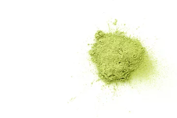 matcha green powder tea on a white background with place for text. Mask for the face. Antioxidant. © Natalia Sarkar