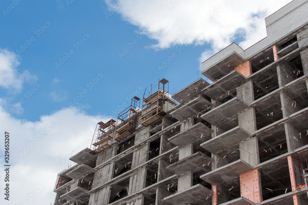 Poster concrete building construction of a new building. concrete construction