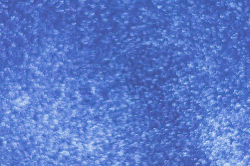 Blue shiny background with sparkles. Abstract holiday background