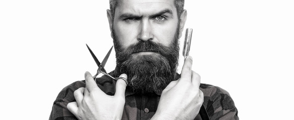 Mens haircut in barber shop. Barber scissors and straight razor, barber shop. Mens haircut, shaving. Male in barbershop - Powered by Adobe