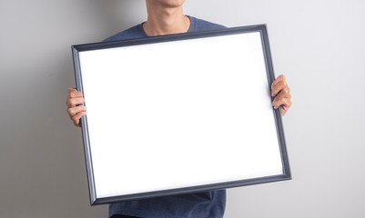 Men holding blank white boards. Your text here mockup design