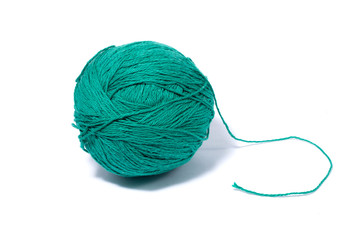 a ball of green knitting yarn, isolate, homemade handicrafts, woolen yarn