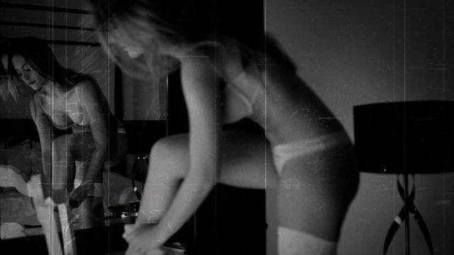 beautiful woman in lingerie reflected in mirror