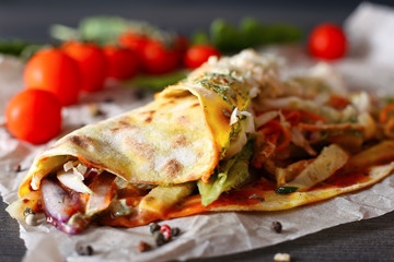 Mexican tacos on a wooden surface