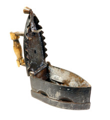 Old iron isolated on a white background. Antique, vintage iron.