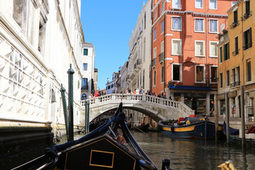  gondola crossing the venice canal