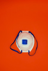 Medical mask, prevention of influenza. Protective mask for health care use on red background. medical health care object