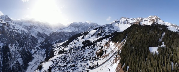 drone aerial panorama of swiss mountains and village/ lauterbrunnen