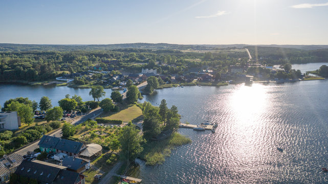 Beautiful aerial view photo from drone on Trakai city, located near Galve lake in Lithuania. Surrounded by beautiful lakes and green islands with plenty of water attractions for tourists available. (s