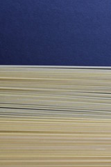 Italian long pasta, on dark background