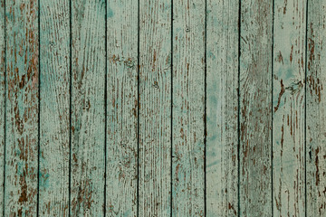 Fototapeta premium Old painted wooden fence. Background texture.