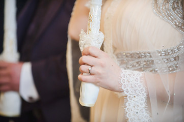 Religious marriage in the Orthodox church. Wedding matrimony. Exchanging wedding rings. 