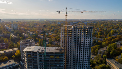 Naklejka premium Construction of high-rise residential building. Aerial view of construction of high-rise apartment building.