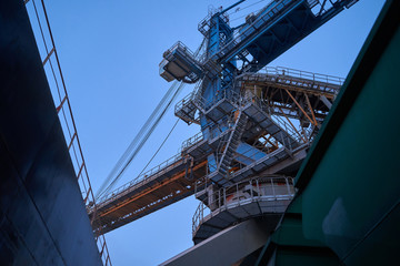 Port grain elevator. Industrial sea trading port bulk cargo zone grain terminal